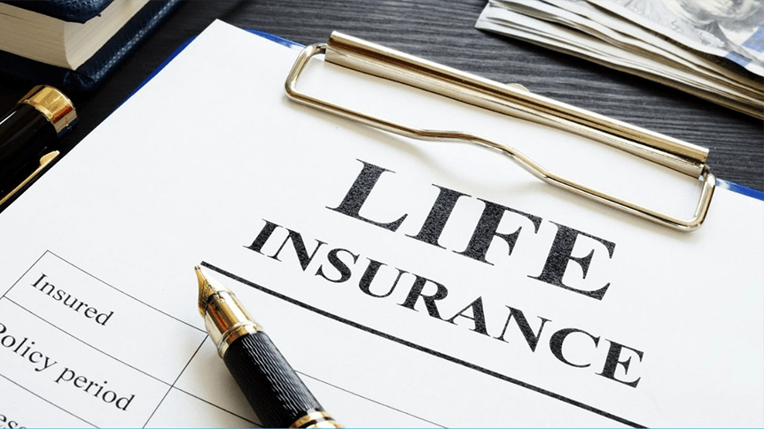 The upper left corner of a Life Insurance form on a blue clipboard with the tip of a gold pen in the bottom left corner